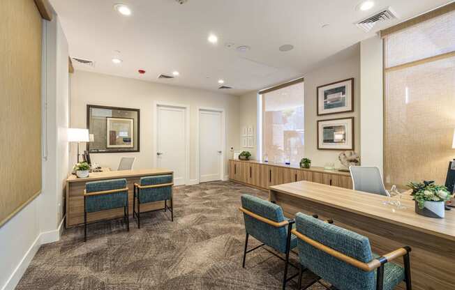 a conference room with chairs and a desk and a window