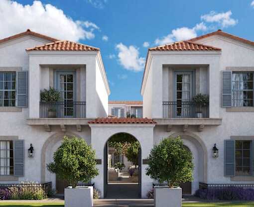 a rendering of a white house with an archway and a courtyard