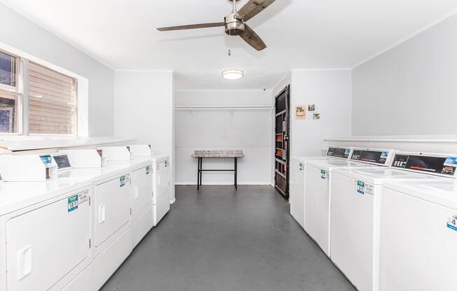 a kitchen with a sink and a refrigerator