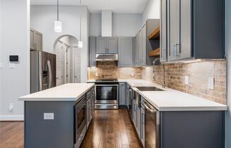 Charming 3-Bedroom Modern Farmhouse with Private Balcony & Downtown Views in Fulton Yards