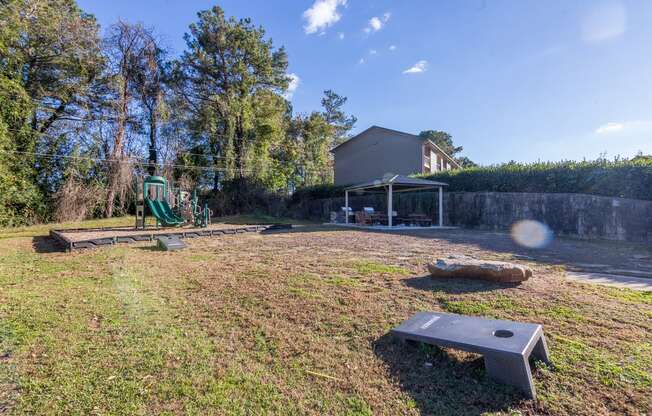 a backyard with a playground and a picnic table at Broadway at East Atlanta, Atlanta, 30316