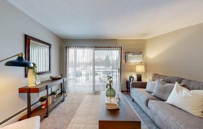 a living room with a couch and a coffee table