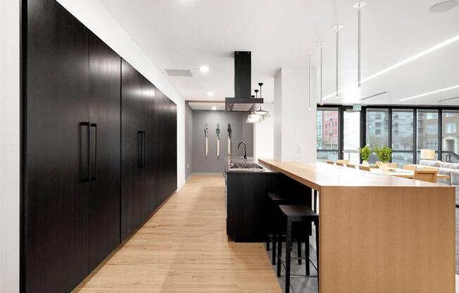 Resident clubroom with gourmet kitchen, hood and cabinets