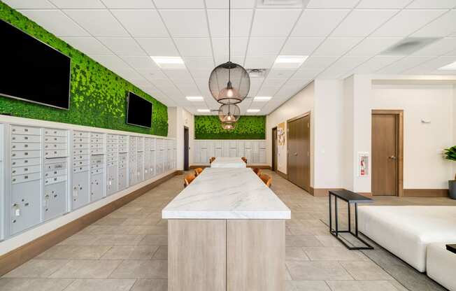 a locker room in a hospital with a long counter and a row of lockers