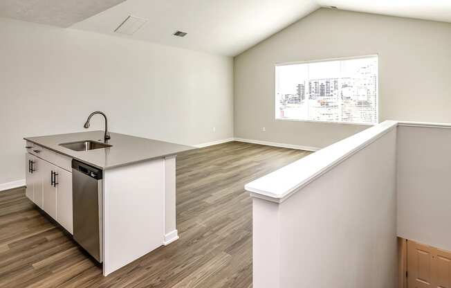 Studio, one two and three bedroom apartments and townhomes featuring open concept floor plans, dens, large windows, stainless steel appliances, quartz countertops, eat-in kitchens, pantries, LVT flooring and much more at The Trails at North Streams in Omaha, NE
