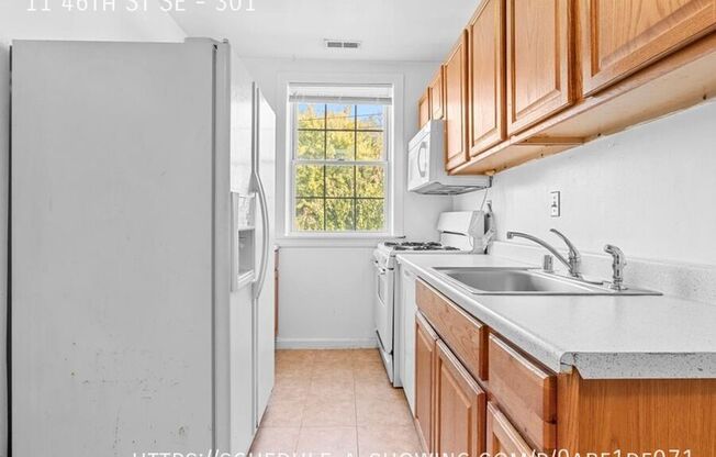 11 46 ST SE