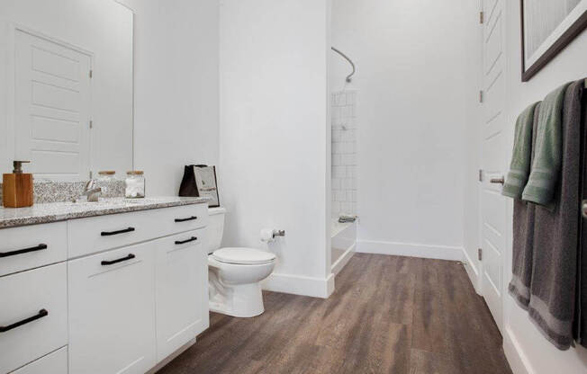 Model bathroom with white cabinets