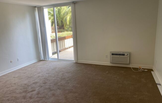 Condo with Private Patio and 2 Parking Spots