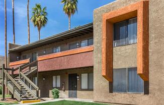 a house that has a sign on the side of a building