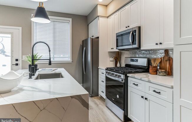 Huge 4 bed 3 bath home in point breeze. MODERN, PATIO, ROOF DECK