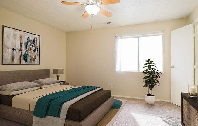 Large Bedroom with Window at georgetowne apartments