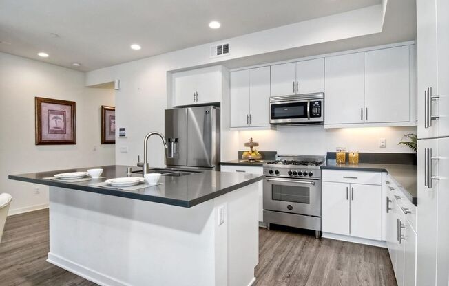 Downtown Oceanside Condo with pool and rooftop deck!