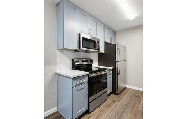 a stainless steel refrigerator in a kitchen