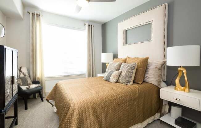 Spacious bedroom accommodates king-sized beds at Metro West, Plano, Texas