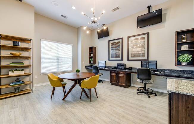 Multiple workstations in business center with free WiFi available at Avenues at Craig Ranch apartments for rent