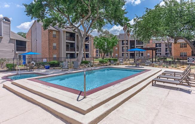 a pool next to a building