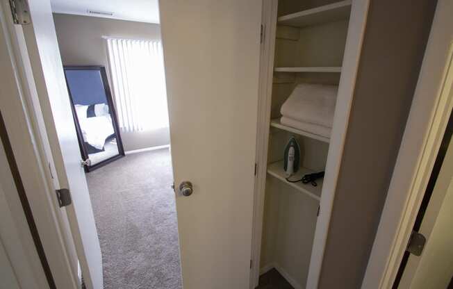 This is a photo of the hallway linen closet in the 950 square foor, 2 bedroom apartment at Deer Hill Apartments in Cincinnati, OH.