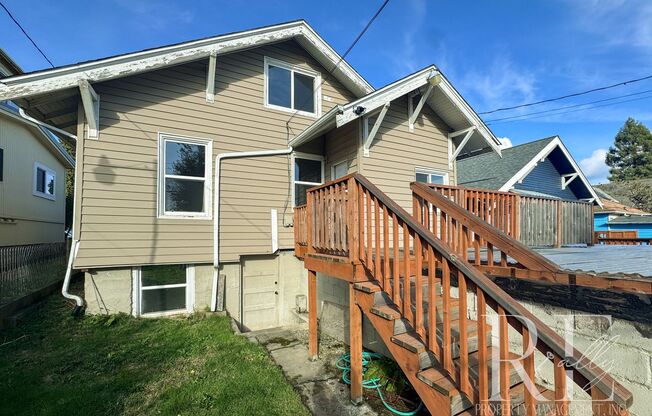 Light-Filled Home with Vaulted Ceilings, Bonus Basement & Walkable Location