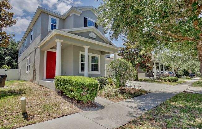 Gorgeous 4/3.5 Home with a Large Fenced Backyard in the Desirable Guard Gated Waters Edge Community at Lake Nona - Orlando!