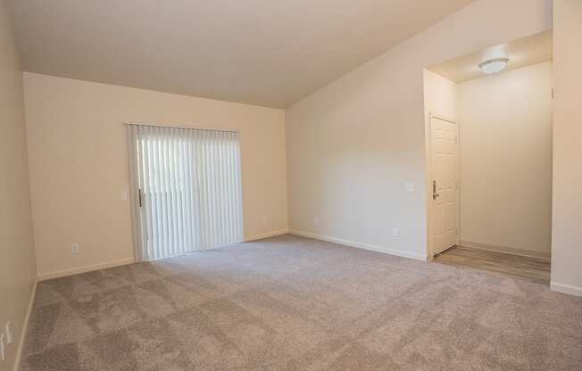 A room with a carpeted floor and a window with blinds at Sunset Summit, Rocklin, CA, 95765