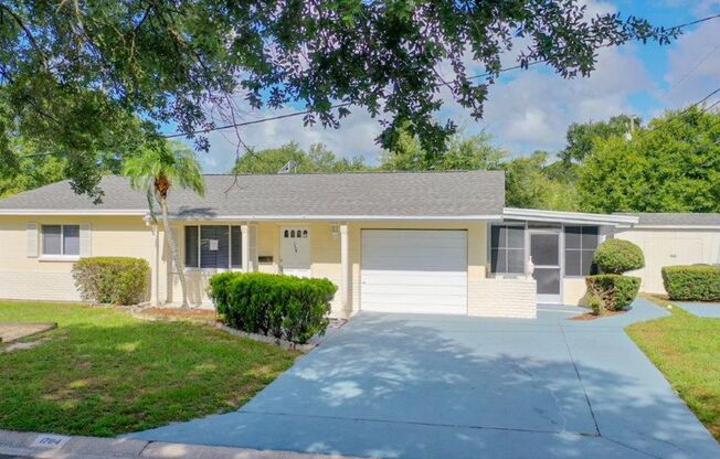 Beautiful 2/2 ~1000Sq. Ft. with NEW floors, recently updated Kitchen with GRANITE!!