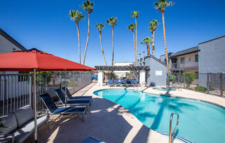 take a dip in the pool at the enclave at woodbridge apartments in sugar land, tx
