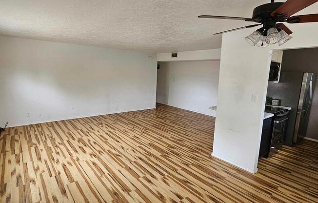 2nd story 2 bedroom, 1 bath condo with central heat and air and one car garage.