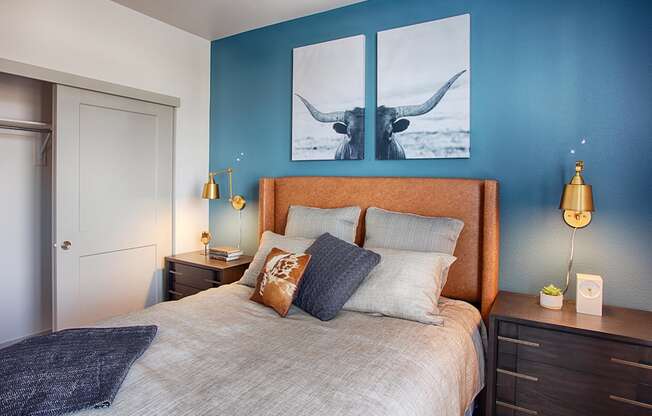 Bedroom with Bed, Nightstands and Blue Accent Wall