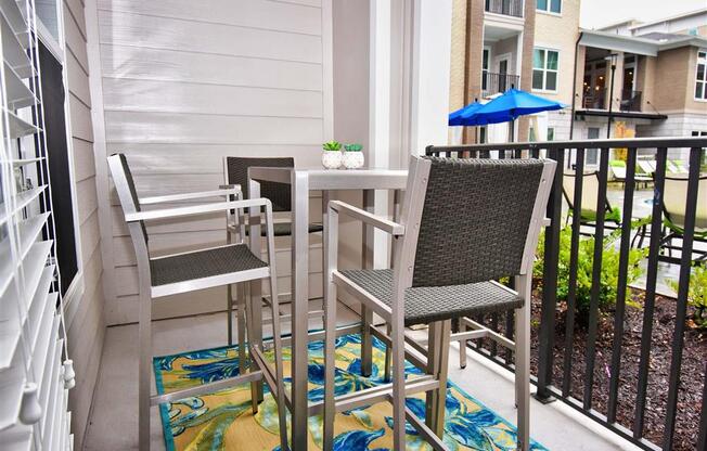 Spacious Pointe at Lake CrabTree Patio With Sitting Arrangements in North Carolina Apartments for Rent