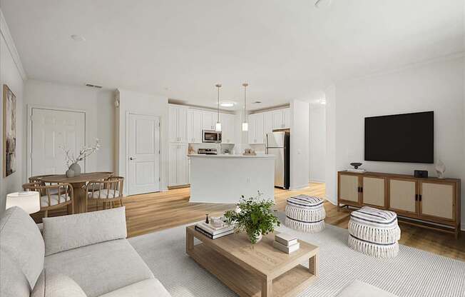 A modern living room with a grey sofa, a wooden coffee table, and a television.