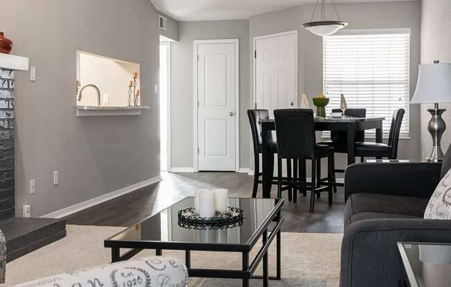 Open Concept Carpeted Living Room and Dining Room with Wood Style Flooring