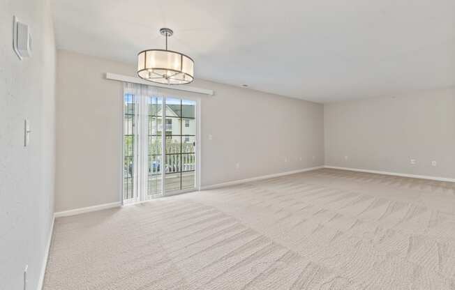 Large Living Room with Natural Light and new Fixtures and Hardware