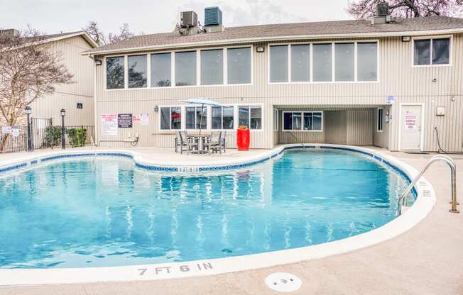 our swimming pool is in front of our home