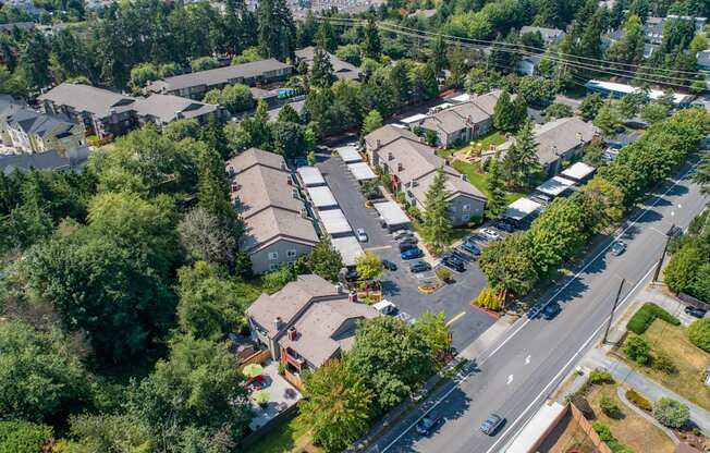 an aerial view of a neighborhood with houses and trees at Quartz Creek, Mountlake Terrace
