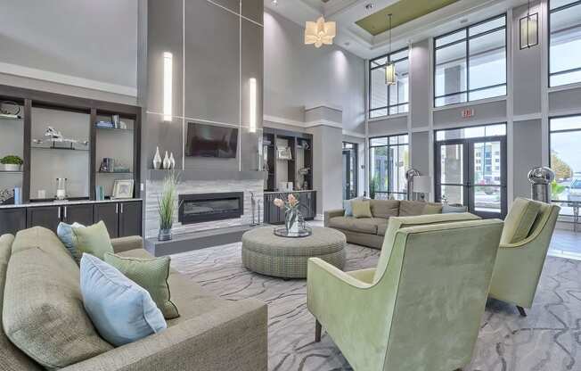 a living room with couches and chairs and a fireplace at Nexus at Sandhill, South Carolina, 29229