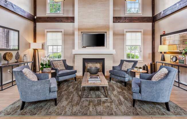 Orchards Apartments Marlborough ma apartment loft style apartments photo of  clubhouse lounge area with large fireplace and mantle with high ceiling and modern furniture
