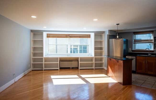 Bright and Peaceful One-Bedroom with Built-Ins and Rooftop Views