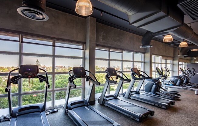 Fitness center with a treadmill at luxury apartments in Miami, FL.