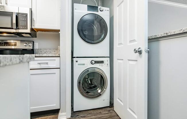 a stove top oven sitting next to a door