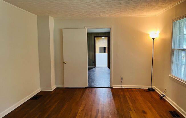 3 bedroom, 1.5 all brick ranch with 2 car garage in College Park! Must see!