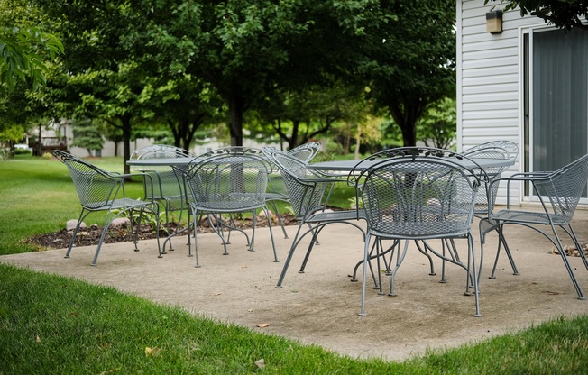 spacious clubhouse, outdoor patio with furniture, reserve small rental for guests inside and outside, at regency apartments in Bettendorf Iowa