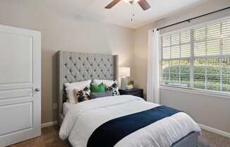 Guest bedroom with bed at The Berkeley Apartments, Georgia, 30096