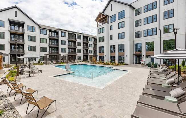Incredible inground saltwater pool with abundant seating at Novel Cary