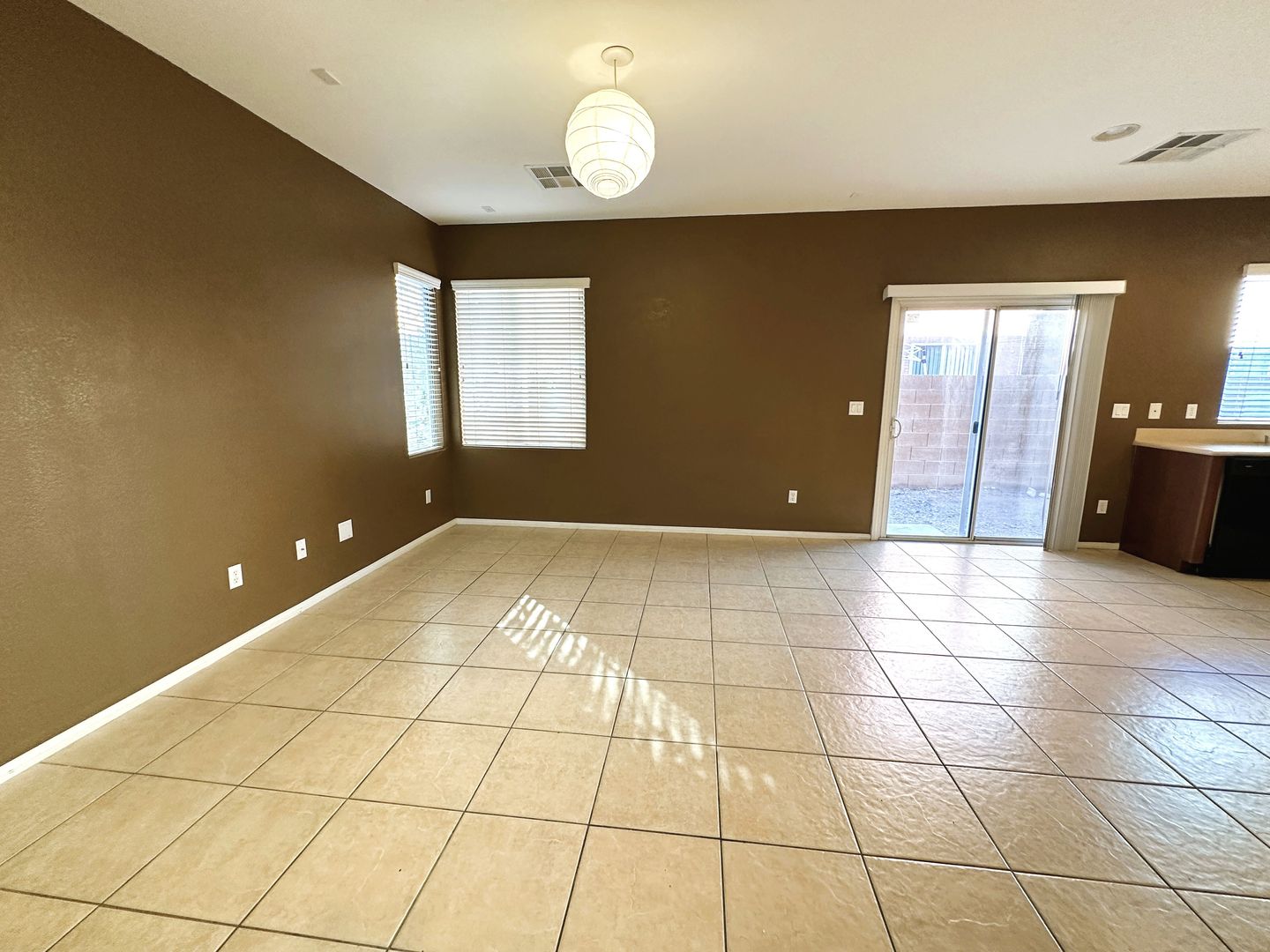 Charming 3 bed/2 bath single-family home in the heart of Blue Diamond! Tiled, downstairs entryway leads to combined kitchen and living room. Upstairs is bathed in natural sunlight, lots of accent windows and wood-rail staircase. Cozy backyard with pavers