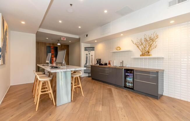 a kitchen with a hard wood floor