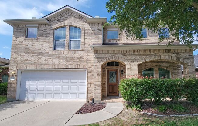 Two Story Remodeled Brick Home in Kingwood!