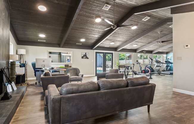 the preserve at ballantyne commons fitness room with couches and chairs