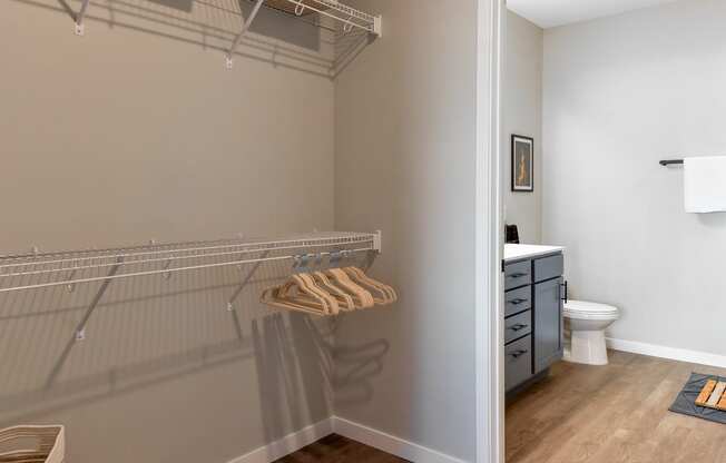 a bathroom with a towel rack and a toilet in it