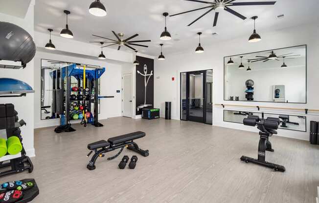 the gym at the flats at big tex apartments