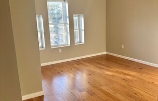 Newly Renovated, Spacious Home for Rent! Large Rooms with Beautiful Hardwood Flooring Throughout! W/D! Central Air! Fenced in Yard! Available Now!